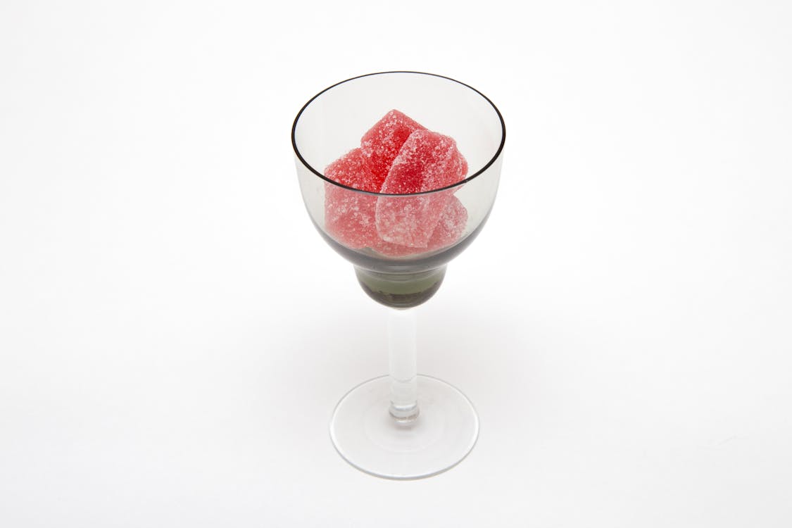 Free Red Gummies in Clear Wine Glass Stock Photo